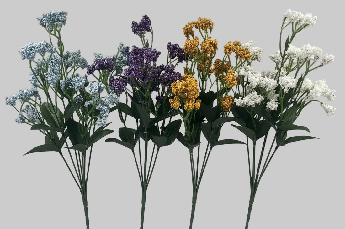 Four different colored flower arrangements on a white background